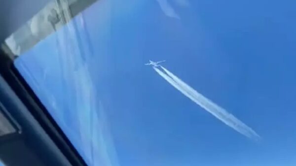 Passengers React to the Close Proximity of Planes in the Sky